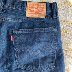 Original Levi’s Strauss dark denim straight leg men’s jeans for sale.